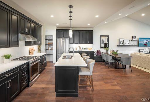 6916 Cedar Drive Bath, PA 18014 - Photo 7 of 19 a large kitchen with a table and chairs in it