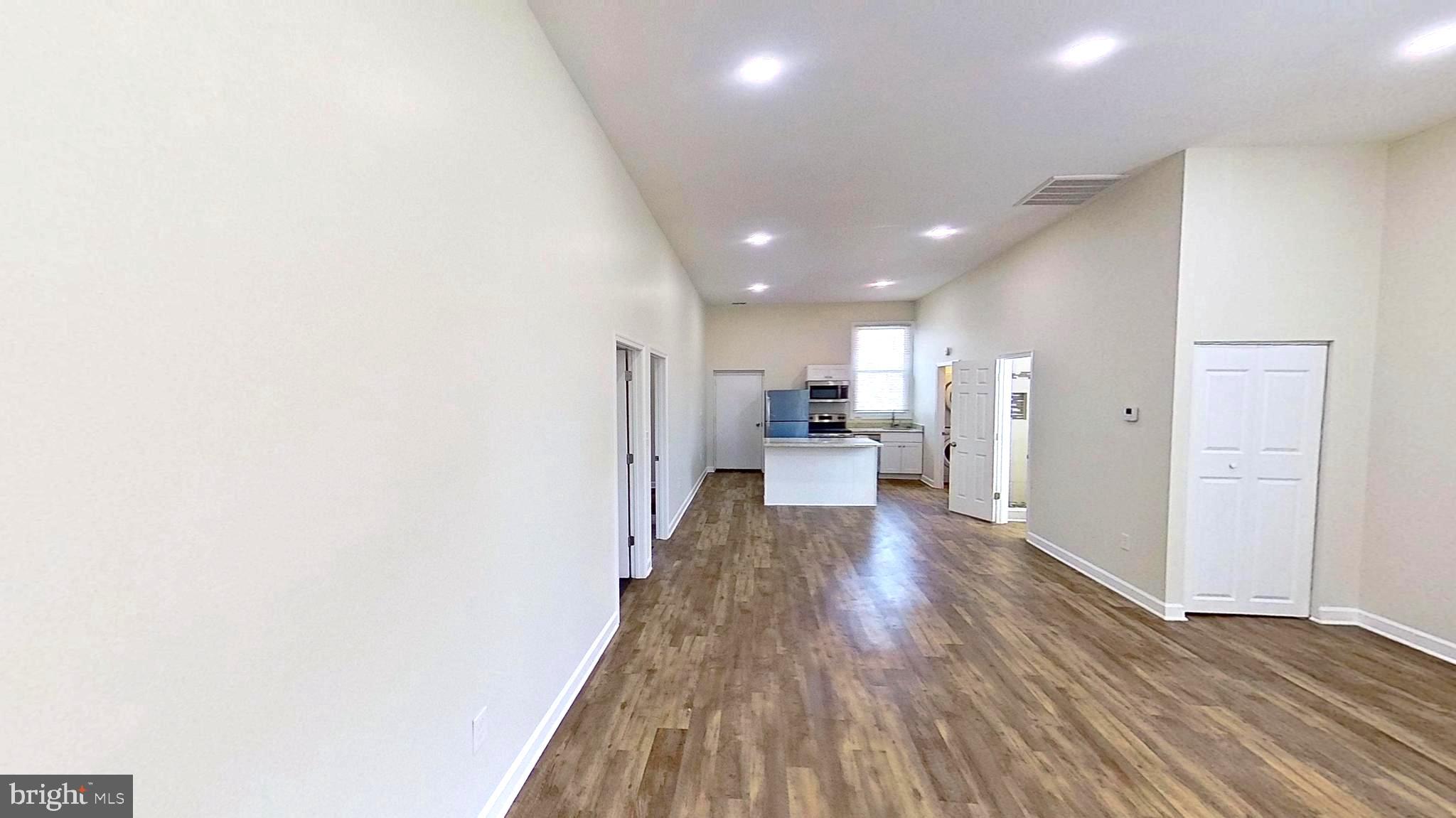 3842 Stoneybrook Road, Unit B White Plains, MD 20695 - Photo 2 of 23 a bathroom with a sink and a refrigerator