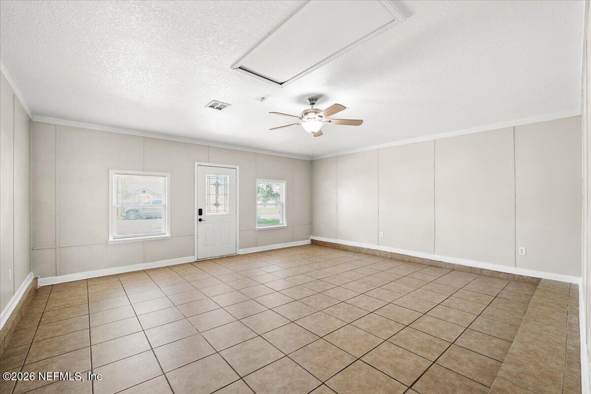 3255 Dowitcher Lane Orange Park, FL 32065 - Photo 12 of 39 a view of an empty room with a window