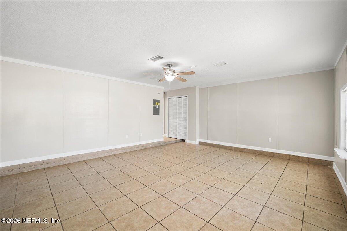 3255 Dowitcher Lane Orange Park, FL 32065 - Photo 14 of 39 a view of an empty room and chandelier fan