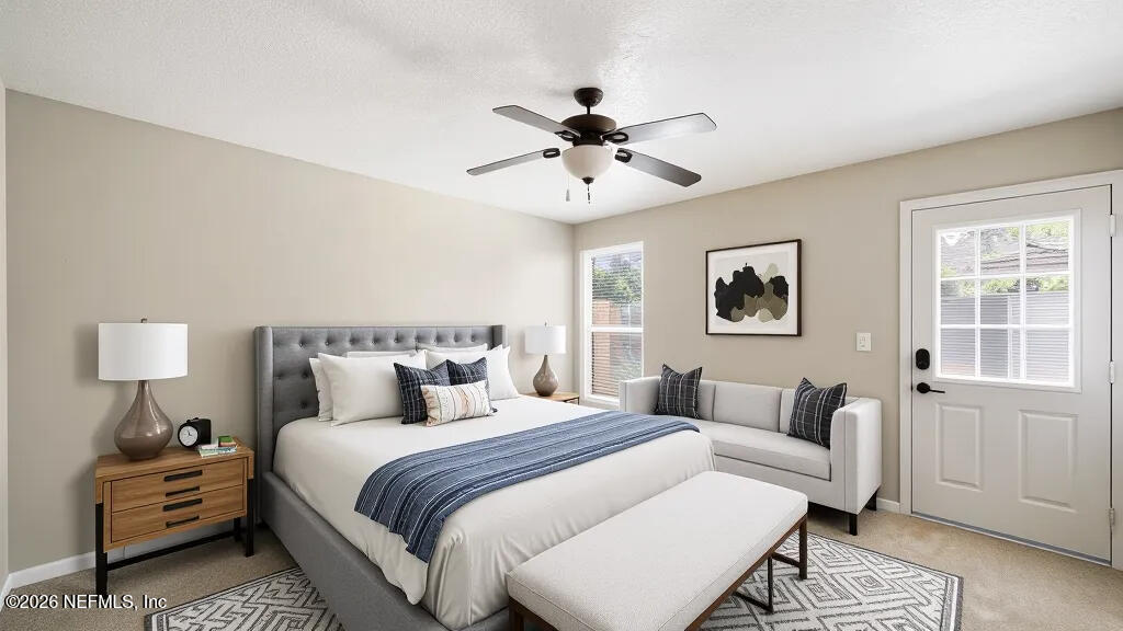3255 Dowitcher Lane Orange Park, FL 32065 - Photo 18 of 39 a bedroom with bed and a window