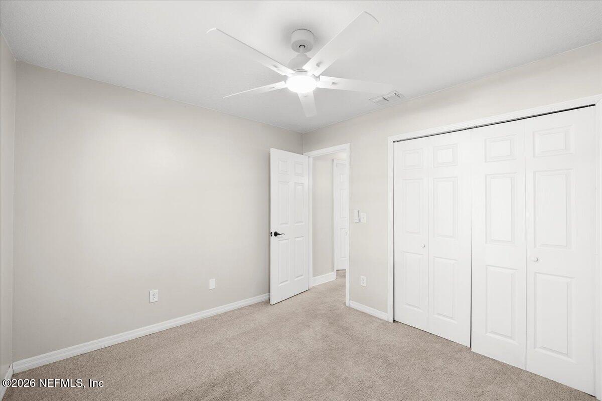 3255 Dowitcher Lane Orange Park, FL 32065 - Photo 22 of 39 a view of an empty room