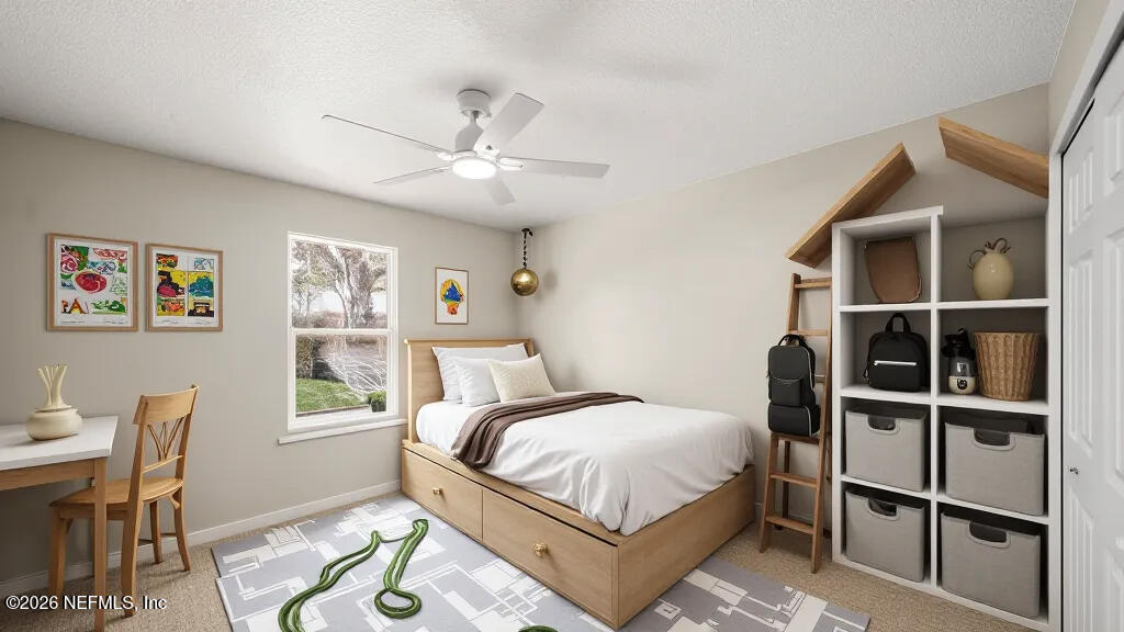 3255 Dowitcher Lane Orange Park, FL 32065 - Photo 23 of 39 a bedroom with a bed and a window