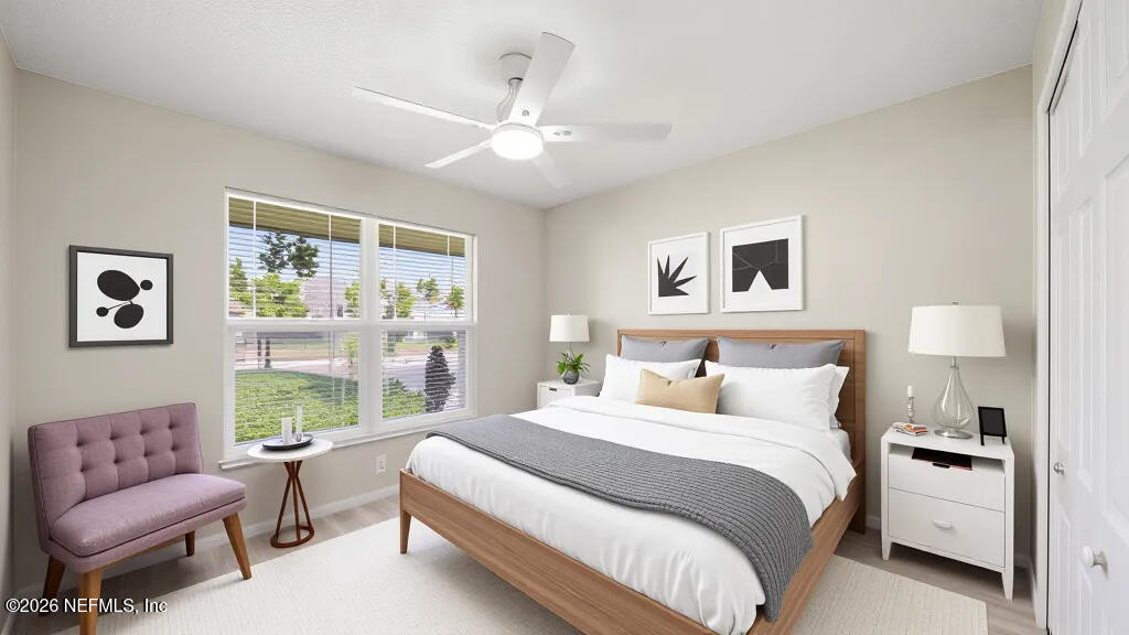 3255 Dowitcher Lane Orange Park, FL 32065 - Photo 30 of 39 a bedroom with a bed and a couch