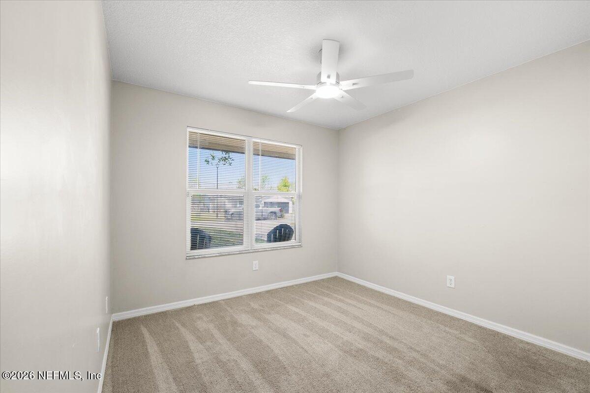 3255 Dowitcher Lane Orange Park, FL 32065 - Photo 31 of 39 an empty room with a window