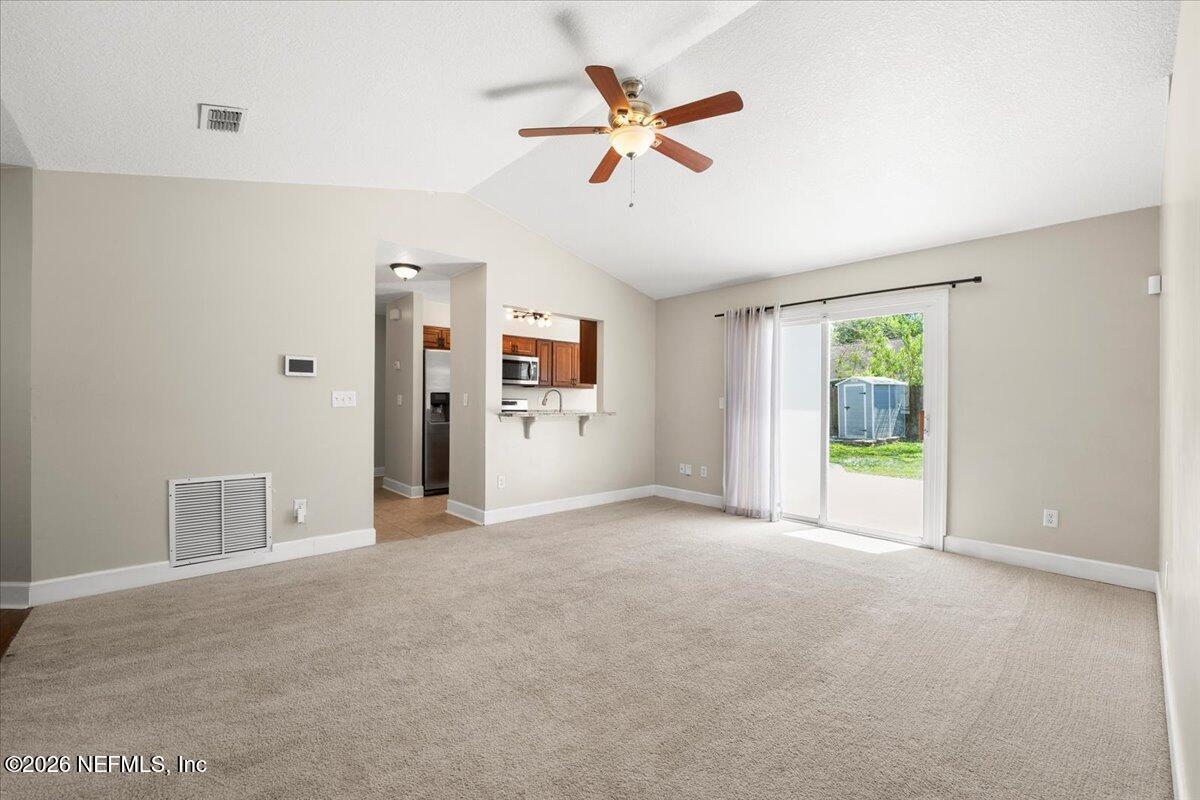 3255 Dowitcher Lane Orange Park, FL 32065 - Photo 4 of 39 a view of an empty room with a window