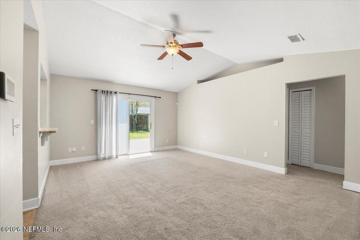 3255 Dowitcher Lane Orange Park, FL 32065 - Photo 6 of 39 a view of an empty room with a window
