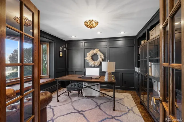 a view of a livingroom with furniture and a window