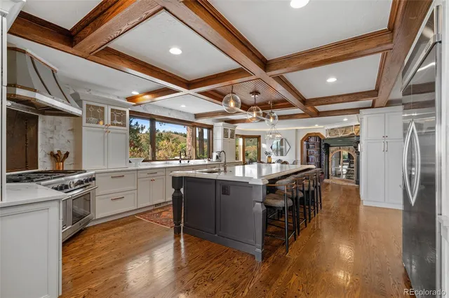 a kitchen with stainless steel appliances granite countertop lots of counter top space