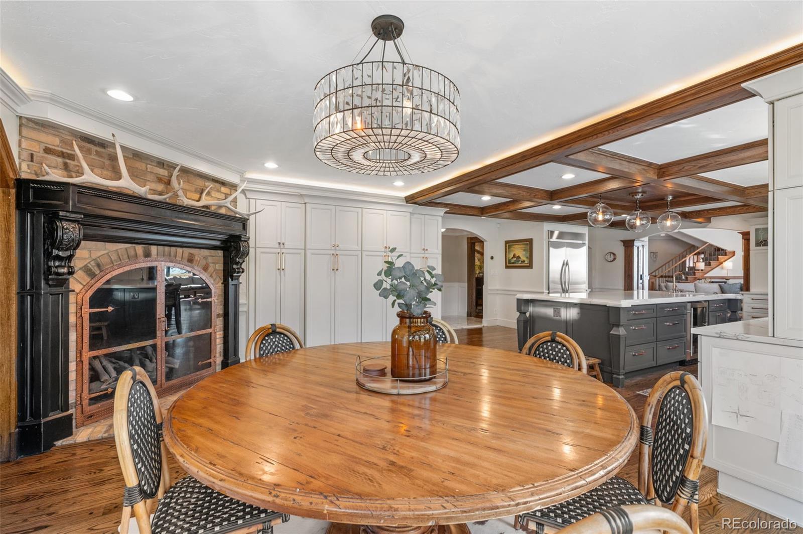 7225 West Box Canyon Road Sedalia, CO 80135 - Photo 23 of 49 a view of a dining room with furniture