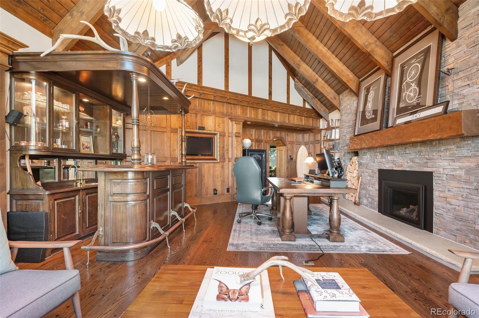 7225 West Box Canyon Road Sedalia, CO 80135 - Photo 25 of 49 a view of a building with sitting area