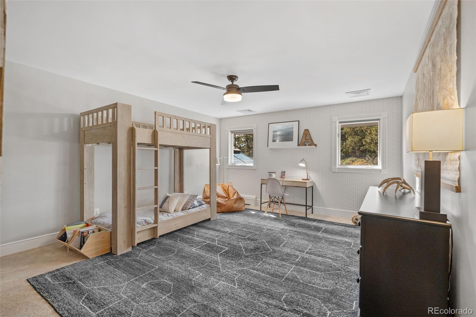7225 West Box Canyon Road Sedalia, CO 80135 - Photo 33 of 49 a living room with furniture and a large window