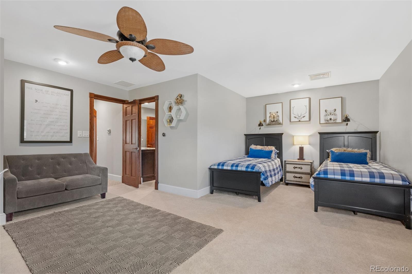 7225 West Box Canyon Road Sedalia, CO 80135 - Photo 34 of 49 a living room with furniture and a couch