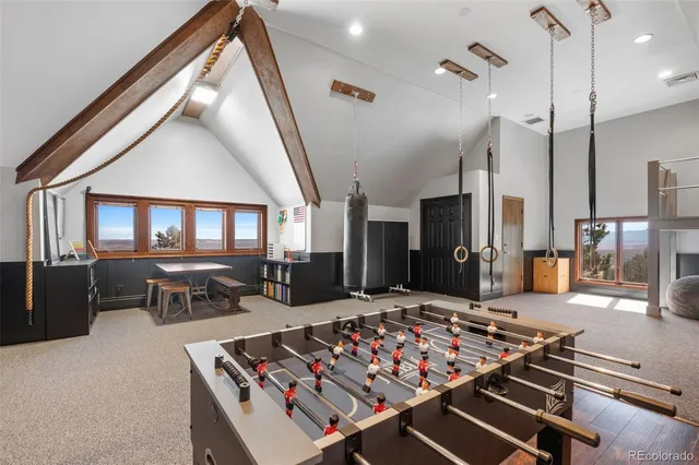 a kitchen with a stove a sink and a cabinets