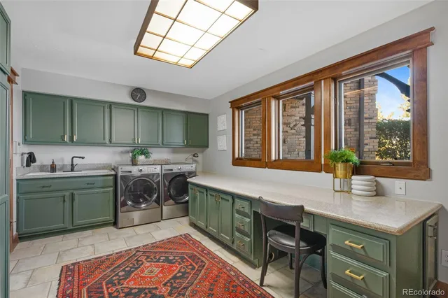 a view of a patio with table and chairs potted plants