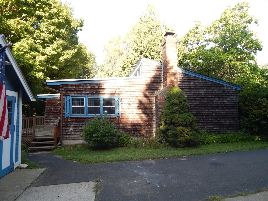 45 Plumtree Road Sunderland, MA 01375 - Photo 4 of 23 a backyard of a house with lots of green space