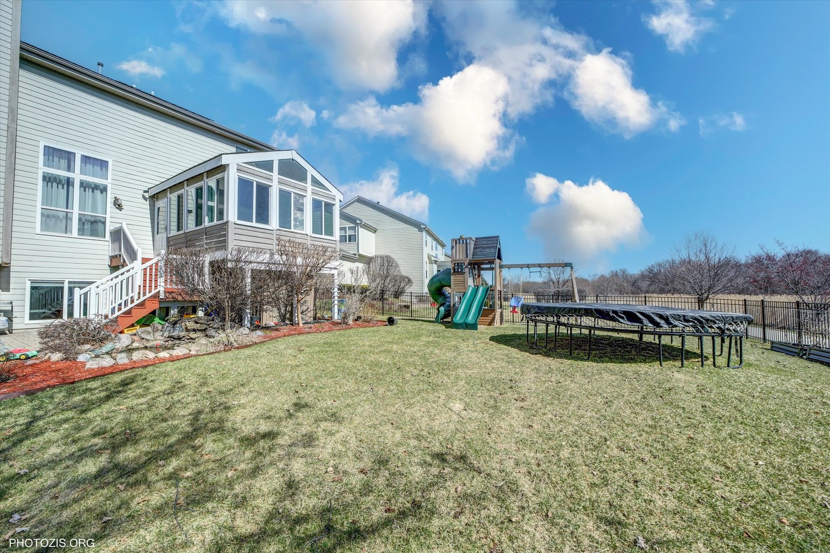2933 Kelly Drive Elgin, IL 60124 - Photo 3 of 10 a view of a house with swimming pool and sitting area