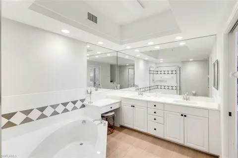 $599,500 | 25161 Sandpiper Greens Court, Unit 203, Bonita Springs, FL 34134