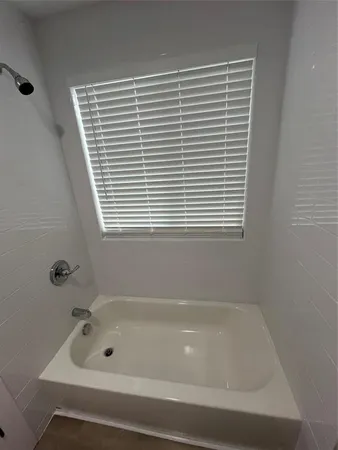 a bathroom with a bathtub