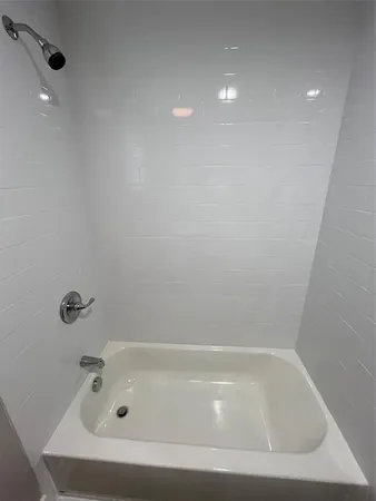 a bathroom with bathtub