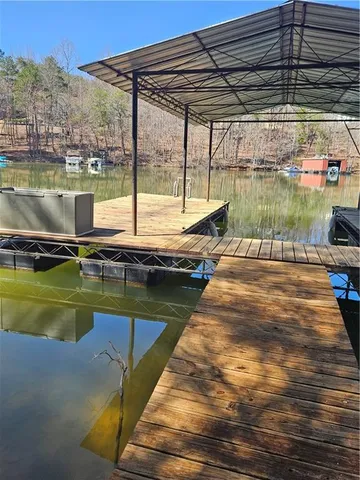 a view of a swimming pool with a lake view