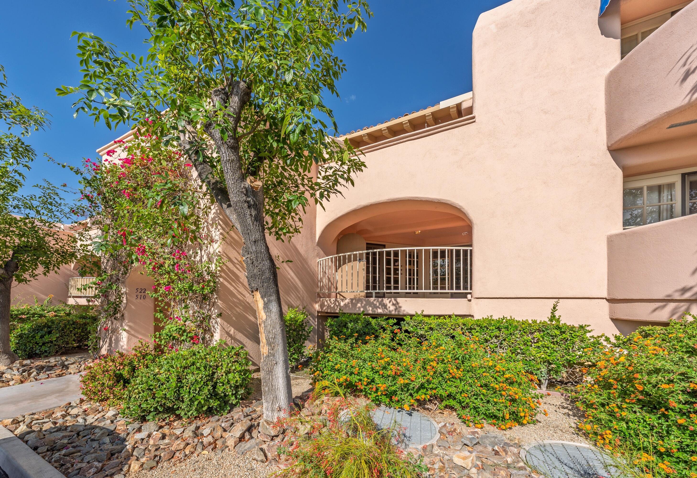 500 East Amado Road, Unit 511 Palm Springs, CA 92262 - Photo 22 of 28 a view of a back yard of the house