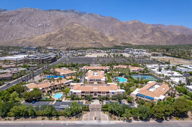 an aerial view of residential houses and trees