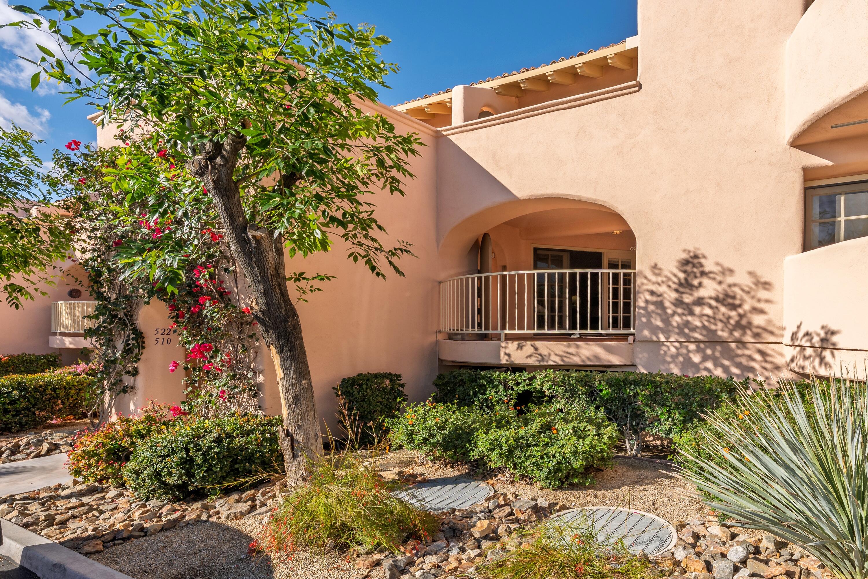 500 East Amado Road, Unit 511 Palm Springs, CA 92262 - Photo 3 of 28 a view of a back yard of the house