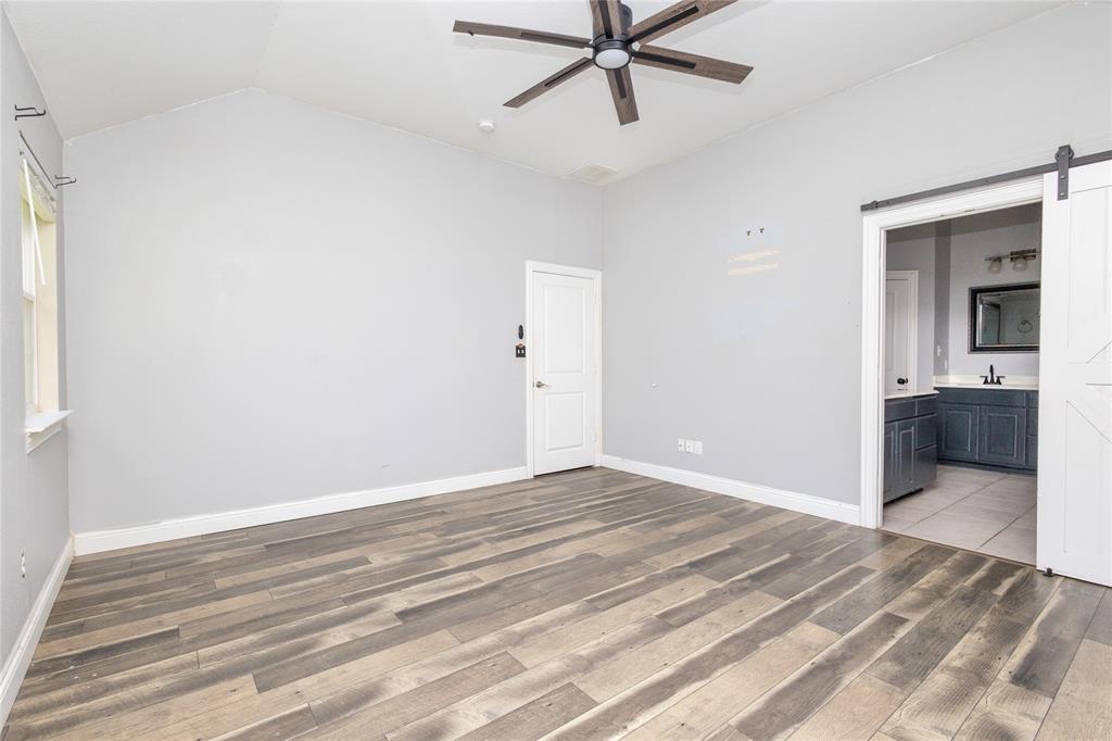 512 Milton Road Josephine, TX 75173 - Photo 15 of 31 a view of a room with a ceiling fan