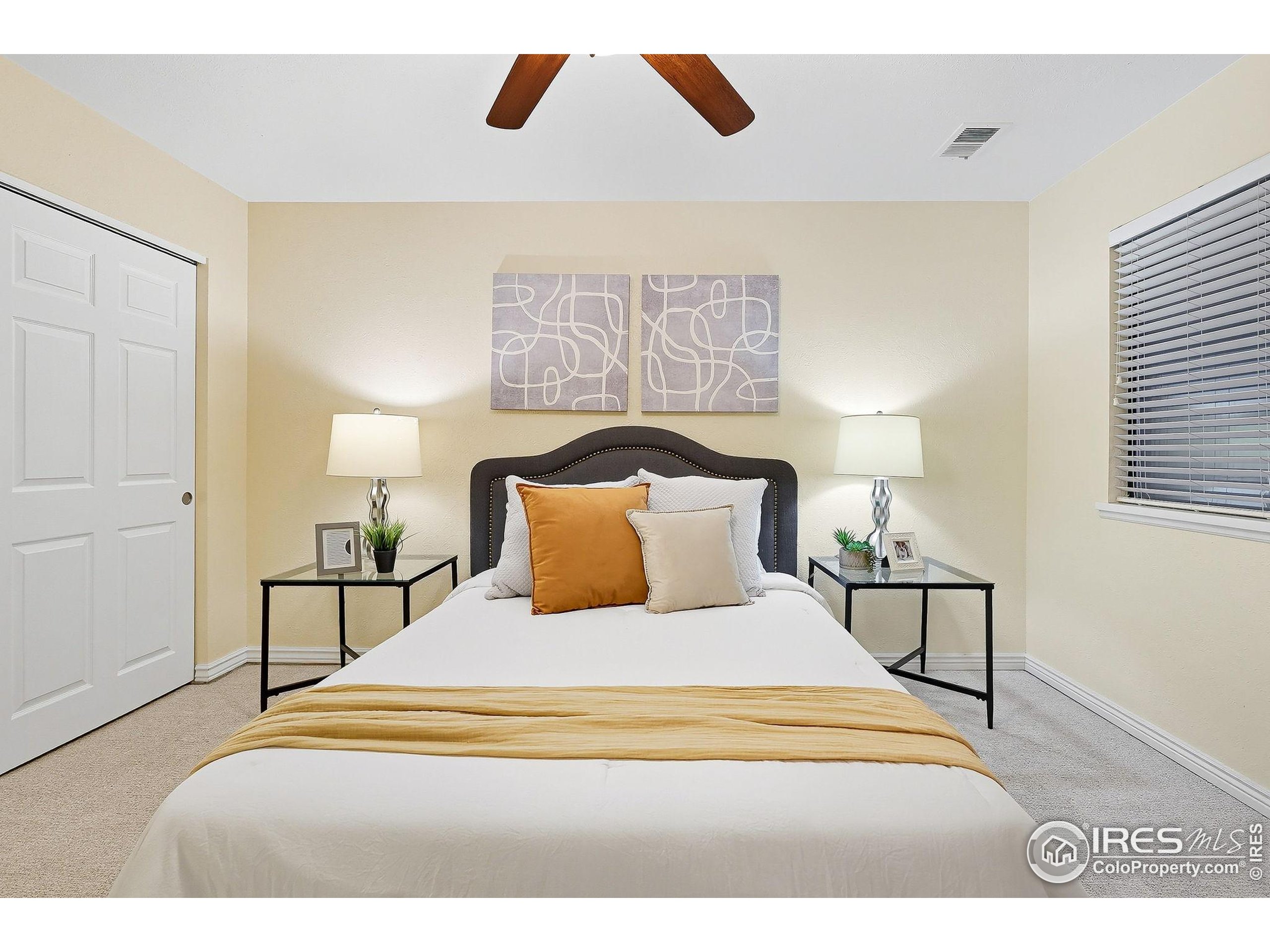 1303 Alpine Avenue, Unit 24 Boulder, CO 80304 - Photo 20 of 46 a bedroom with a bed and window