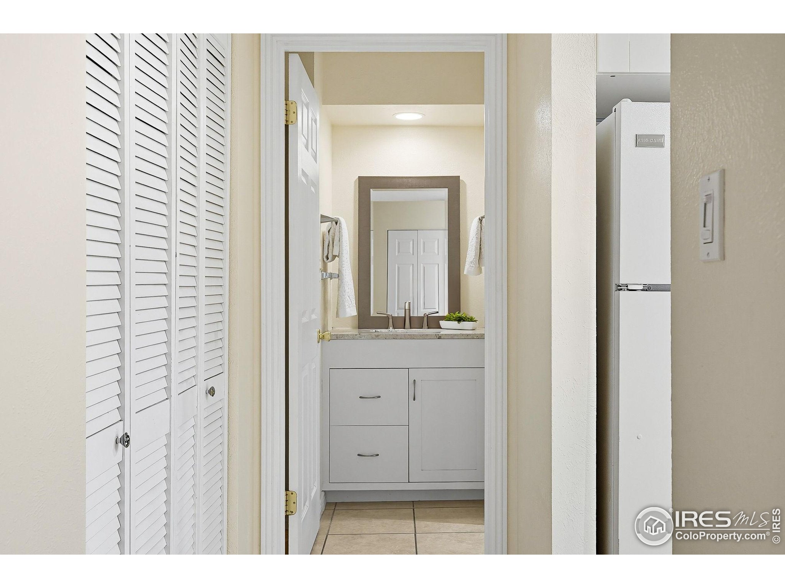 1303 Alpine Avenue, Unit 24 Boulder, CO 80304 - Photo 27 of 46 a bathroom with a sink and a mirror