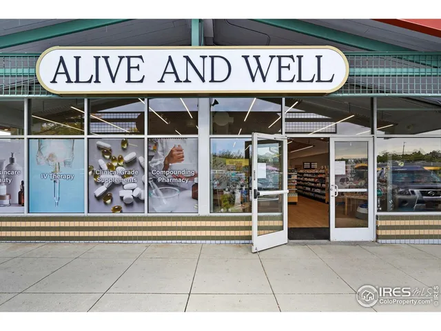 a view of a cafe with sitting area