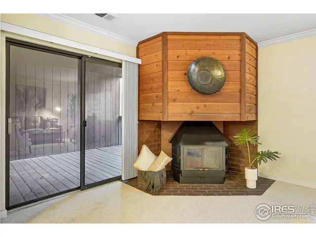 a living room with a mirror