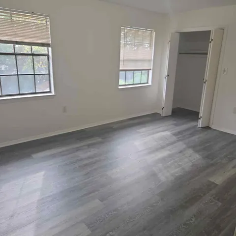 an empty room with windows