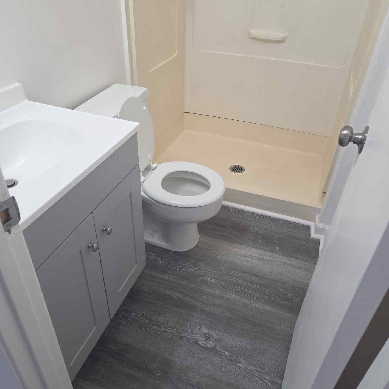 90 6th Avenue, Unit 4 Shalimar, FL 32579 - Photo 6 of 10 a bathroom with a toilet and a sink