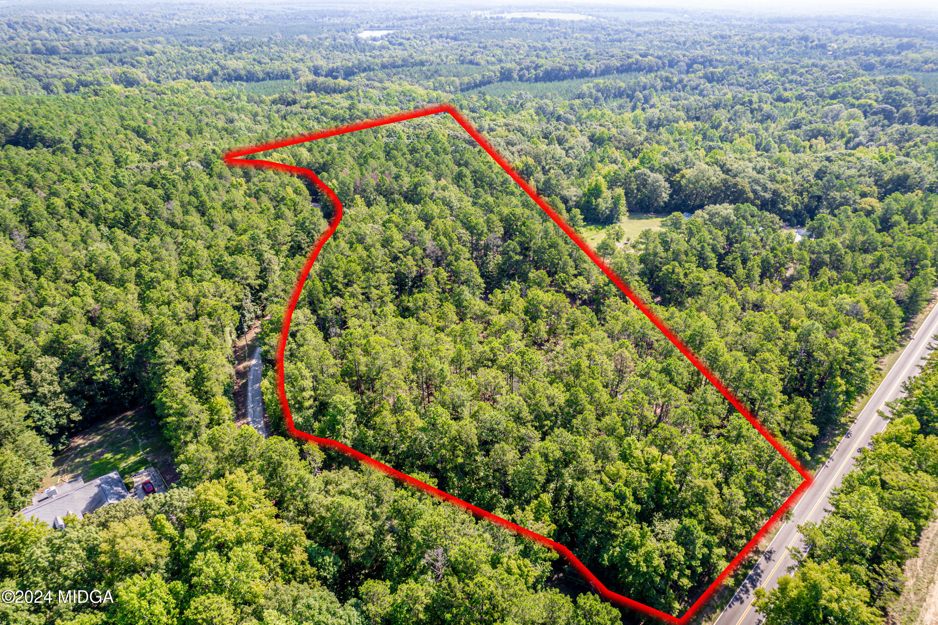 359 Bowen Hill Road Haddock, GA 31033 - Photo 1 of 16 an aerial view of a houses