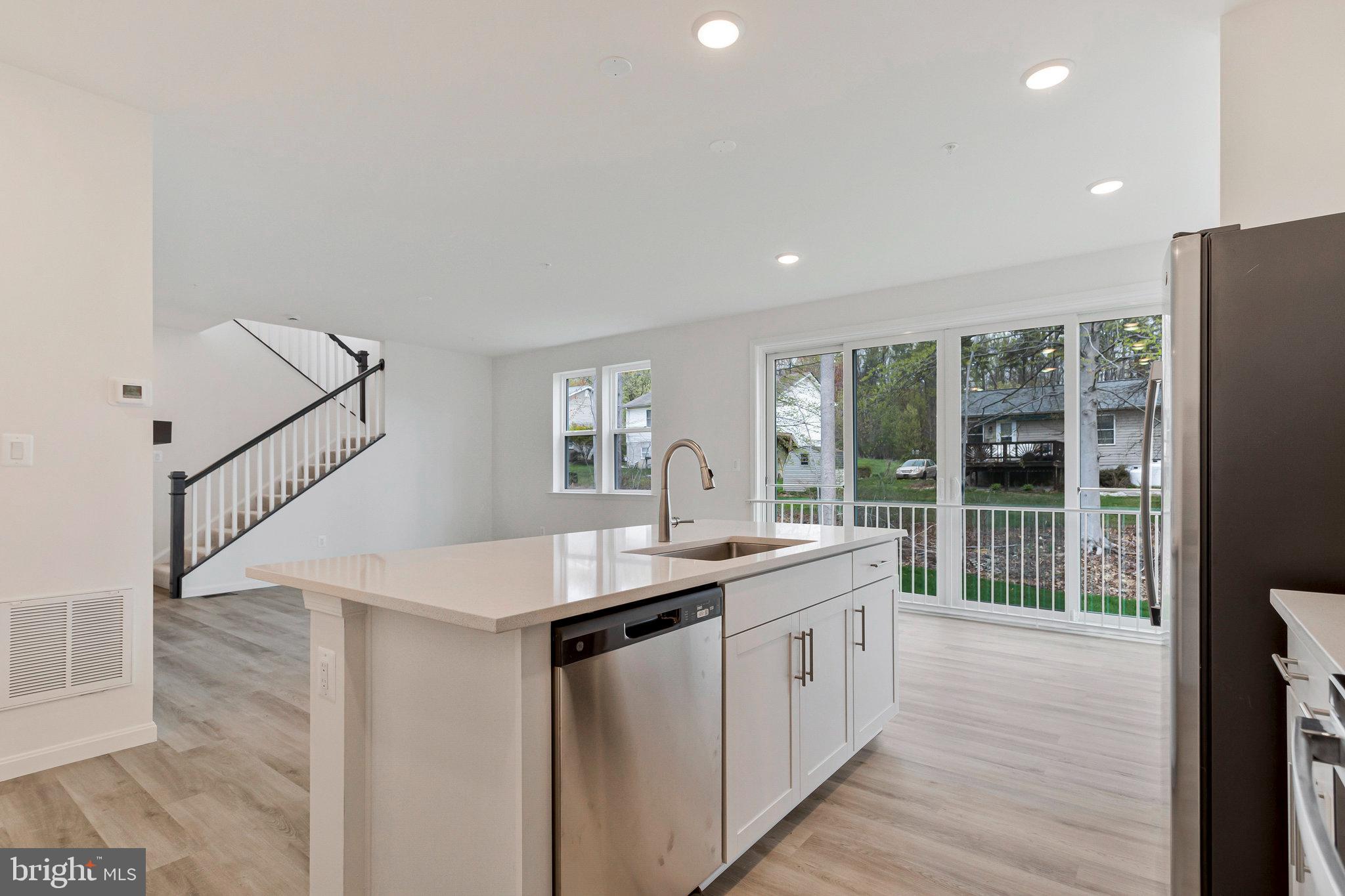 18 Poplar Court North East, MD 21901 - Photo 11 of 42 a kitchen with sink and refrigerator