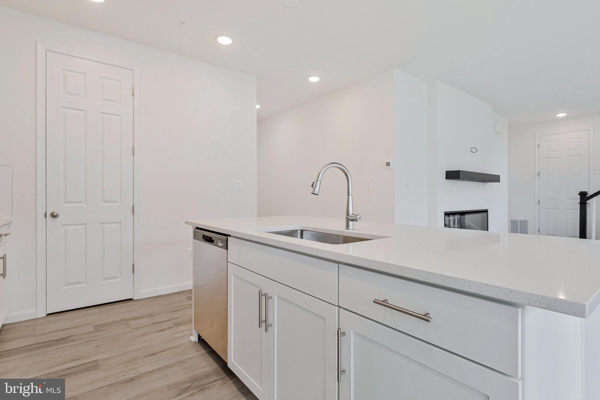 18 Poplar Court North East, MD 21901 - Photo 12 of 42 a kitchen with a sink and cabinets