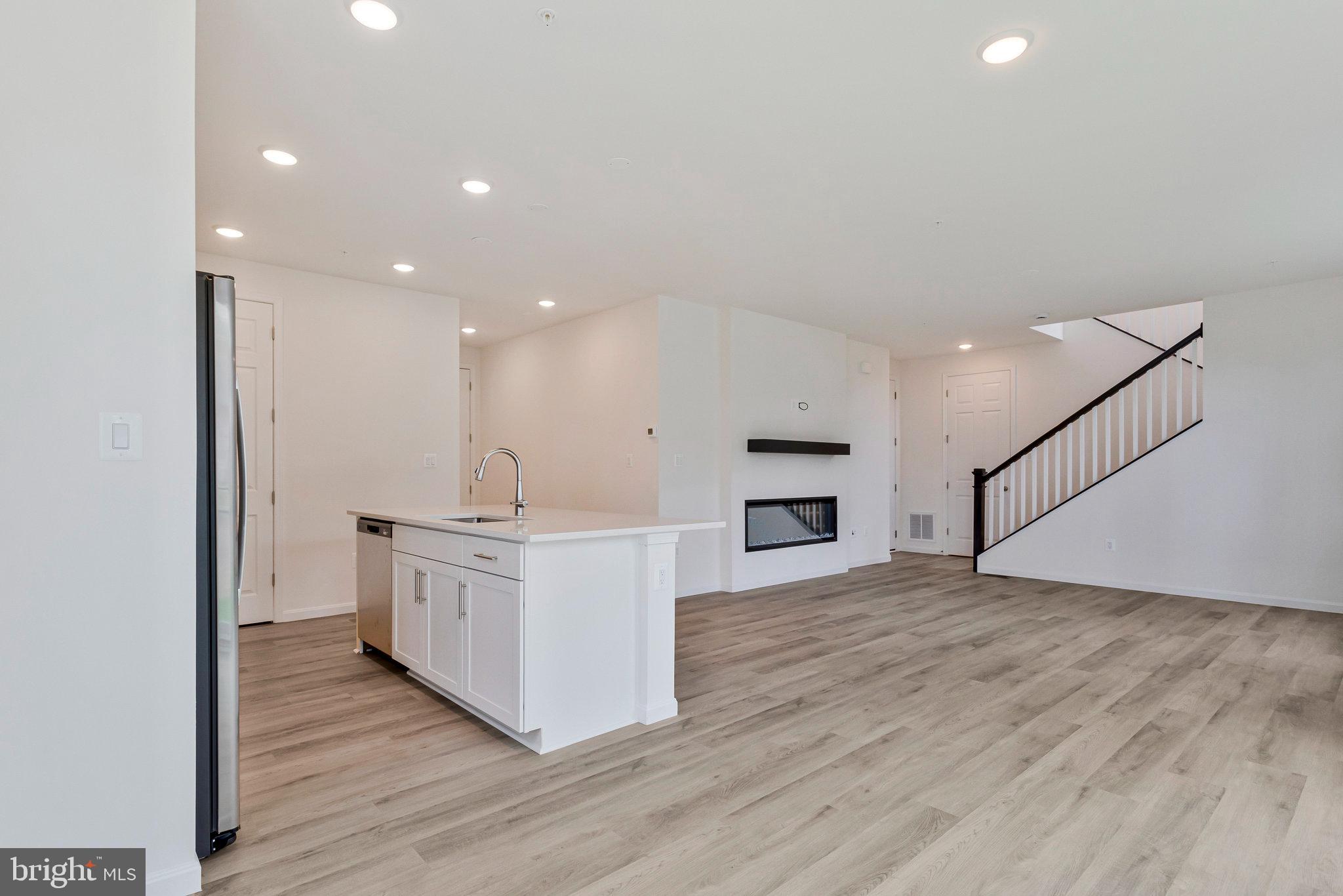 18 Poplar Court North East, MD 21901 - Photo 14 of 42 a kitchen with stainless steel appliances granite countertop a wooden floors