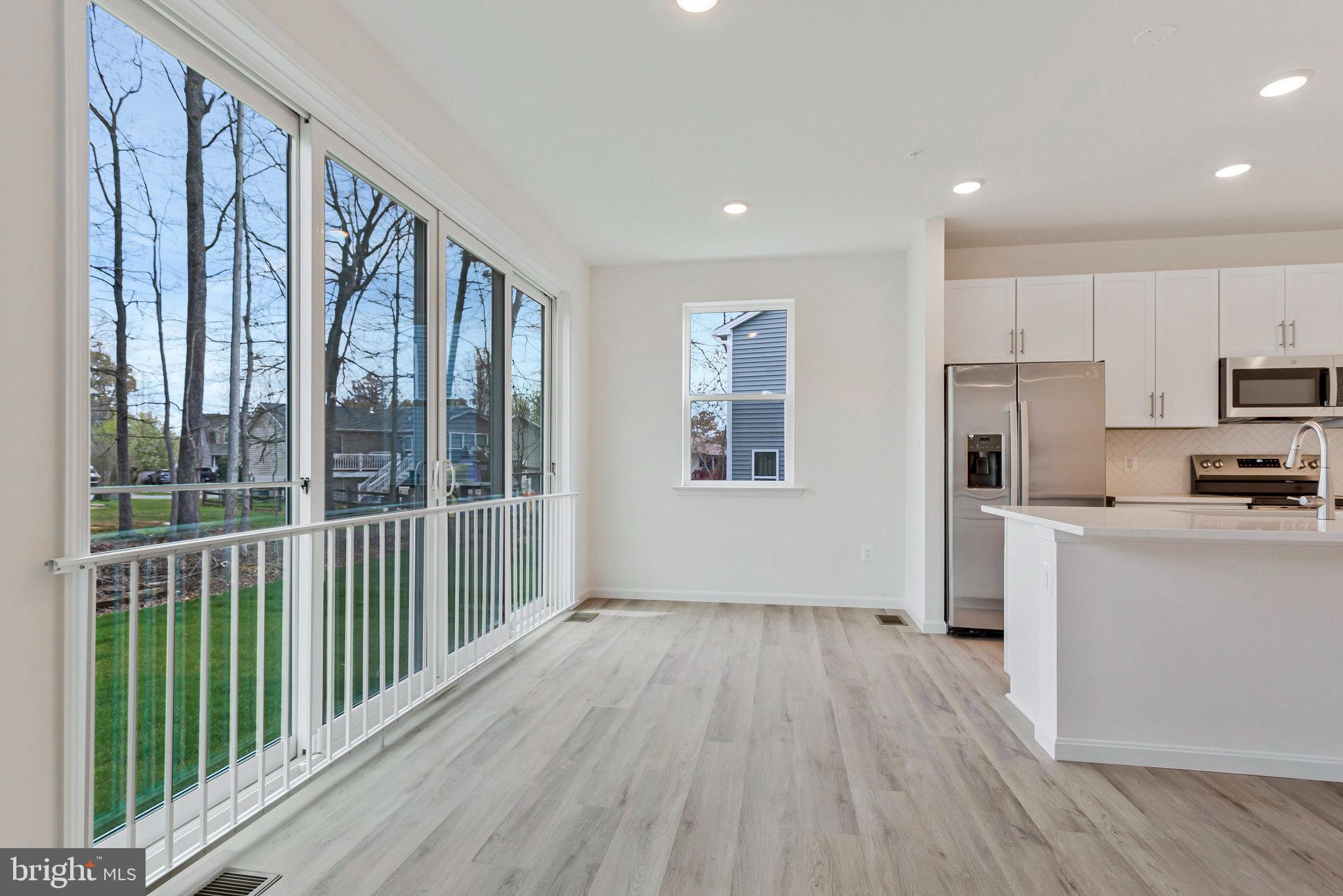 18 Poplar Court North East, MD 21901 - Photo 15 of 42 a view of a kitchen with wooden floor and electronic appliances