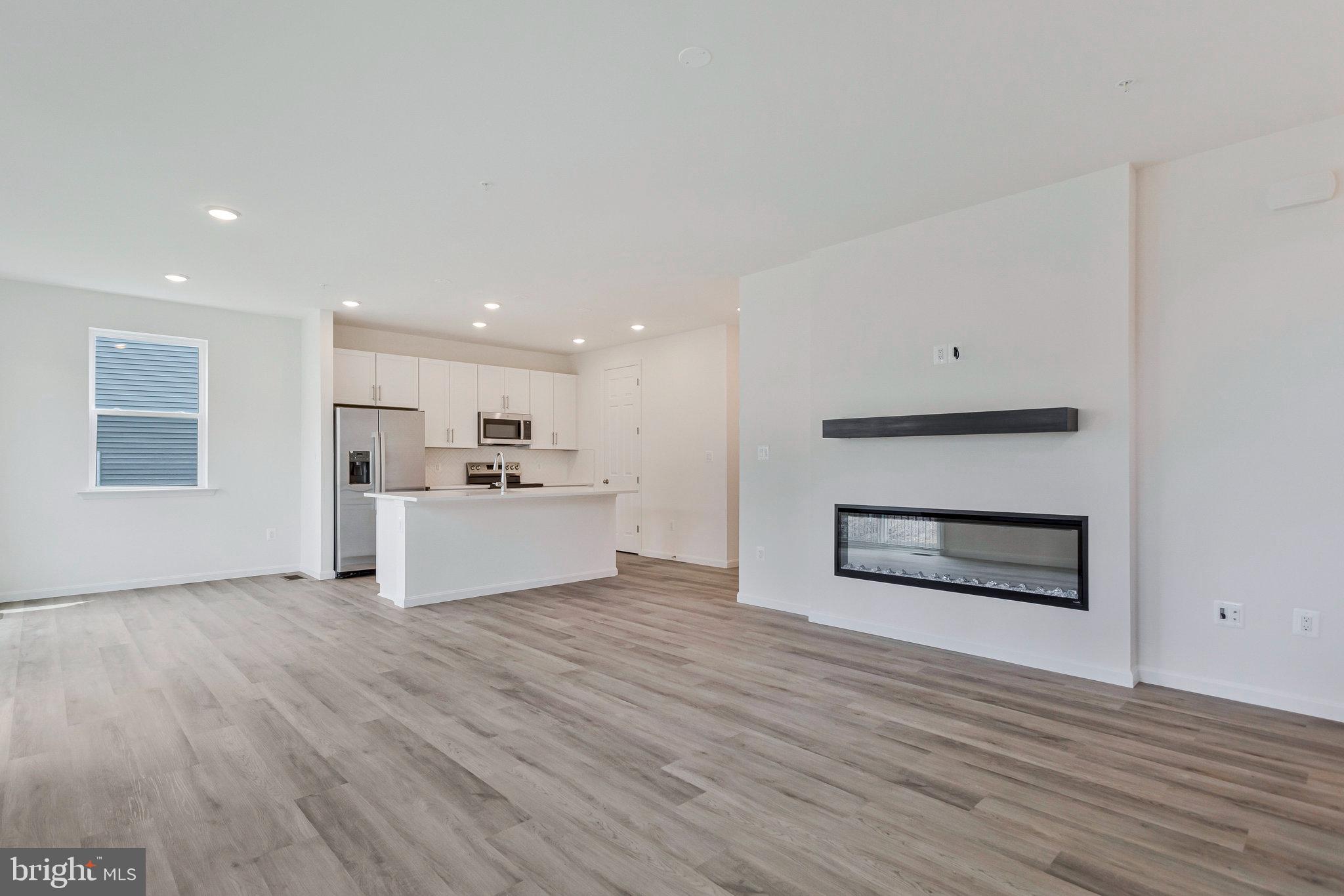 18 Poplar Court North East, MD 21901 - Photo 18 of 42 a view of a kitchen with wooden floor and windows