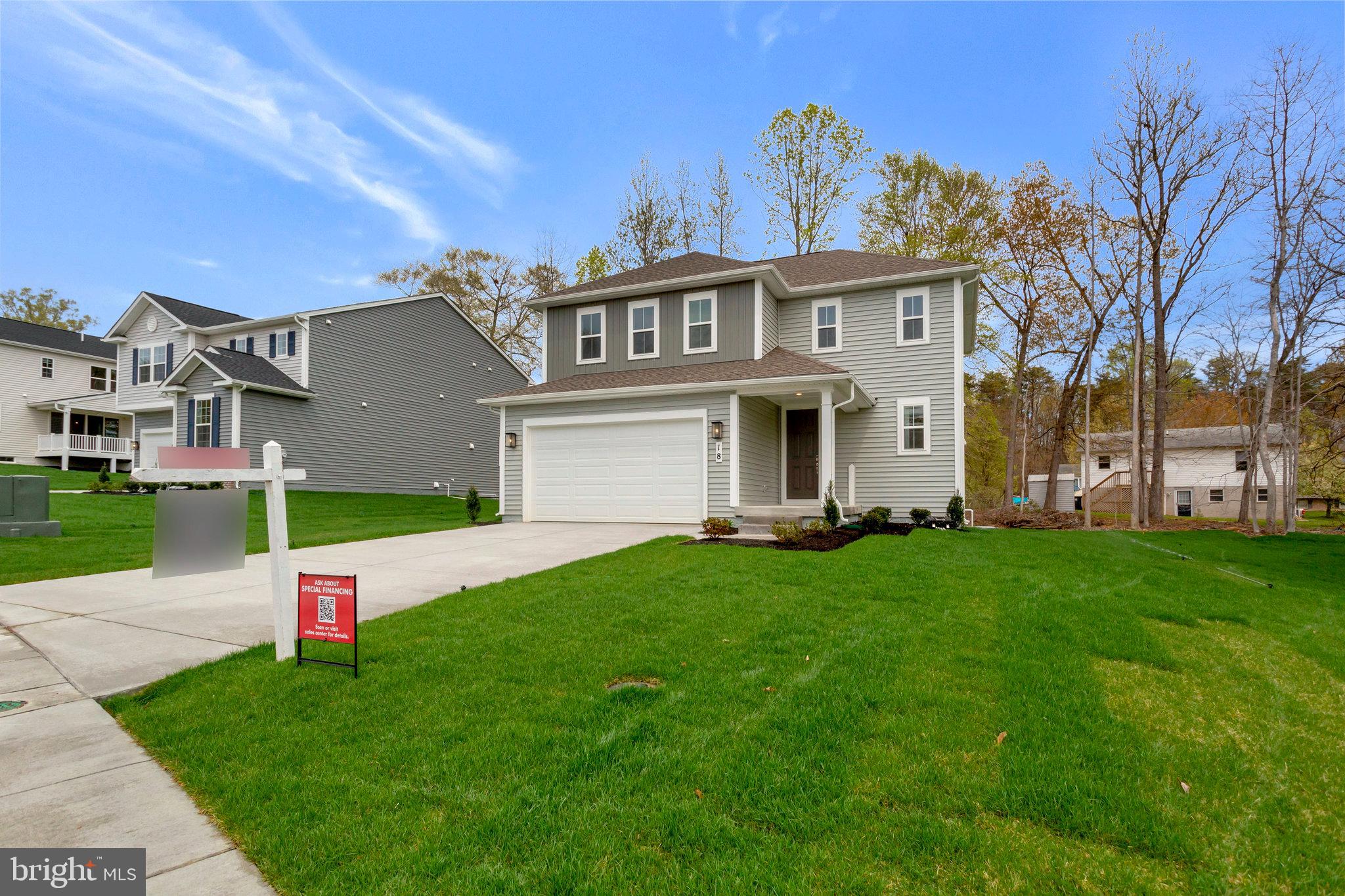 18 Poplar Court North East, MD 21901 - Photo 2 of 42 a view of a house with a yard