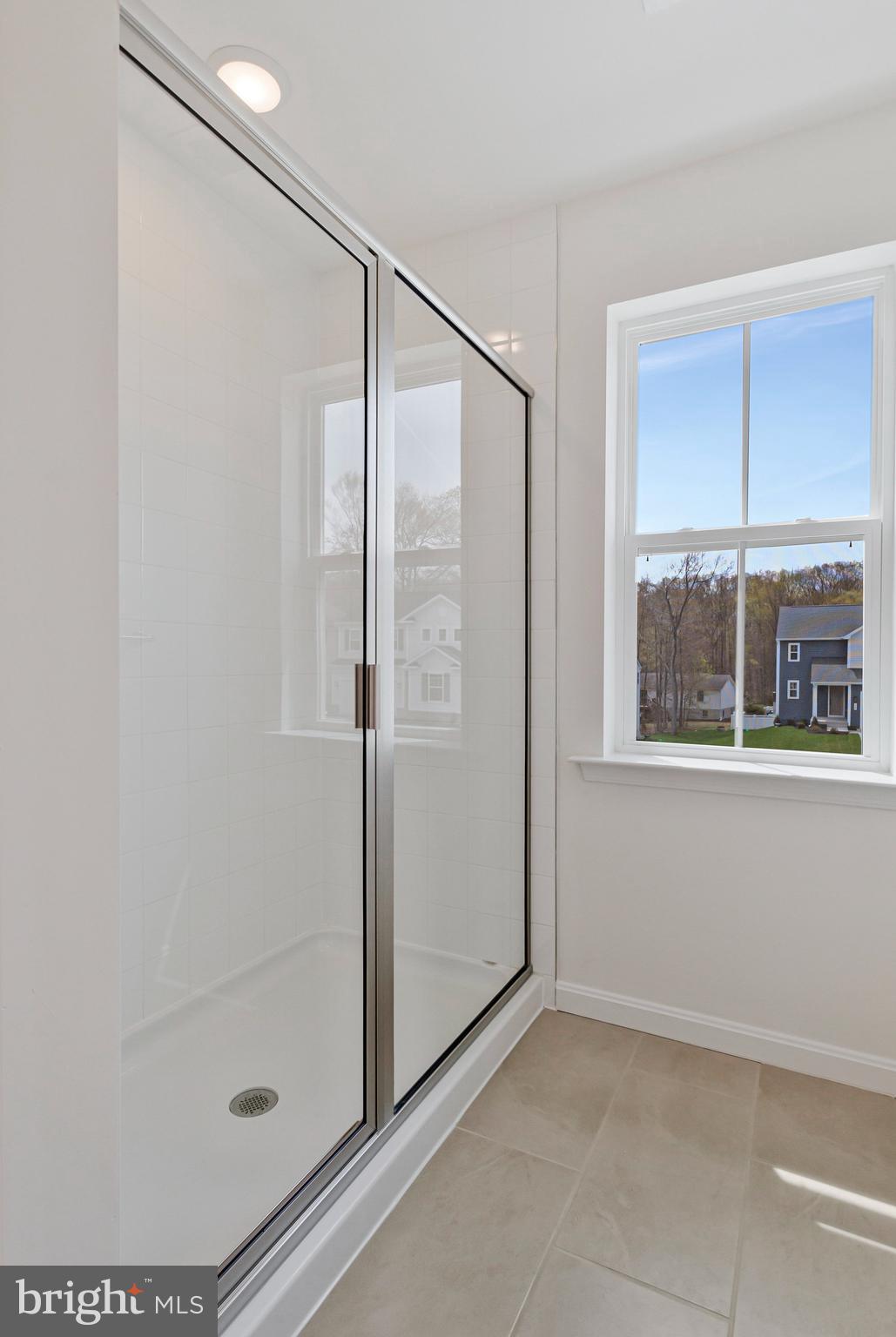 18 Poplar Court North East, MD 21901 - Photo 25 of 42 a bathroom with a glass shower door