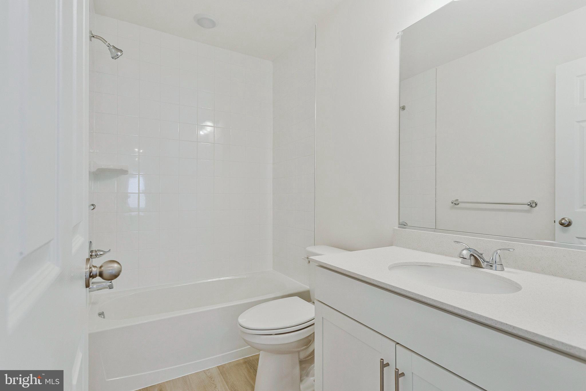 18 Poplar Court North East, MD 21901 - Photo 30 of 42 a bathroom with a sink a toilet and shower