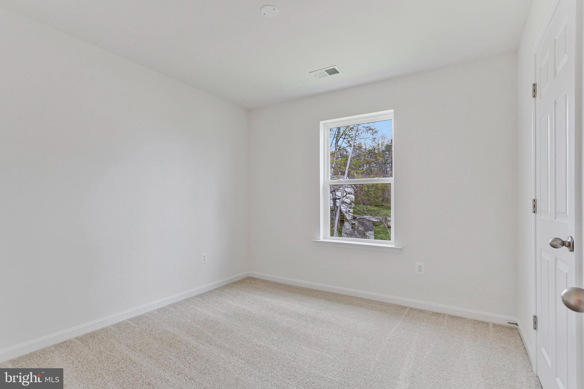 18 Poplar Court North East, MD 21901 - Photo 34 of 42 an empty room with a window