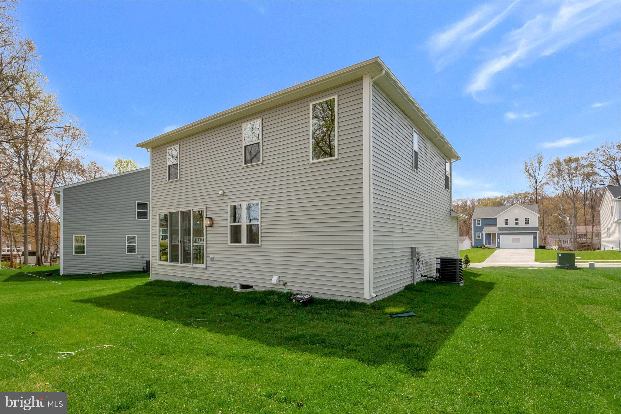 18 Poplar Court North East, MD 21901 - Photo 39 of 42 a front view of a house with a yard