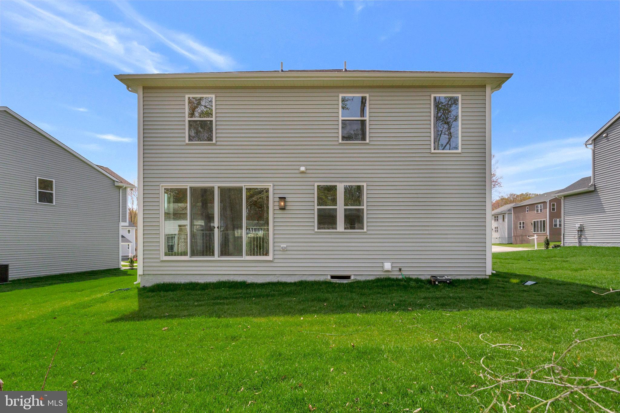 18 Poplar Court North East, MD 21901 - Photo 40 of 42 a front view of a house with a garden