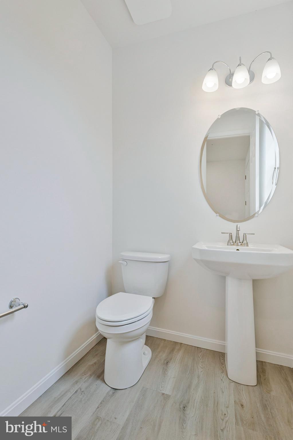 18 Poplar Court North East, MD 21901 - Photo 8 of 42 a bathroom with a toilet sink and mirror