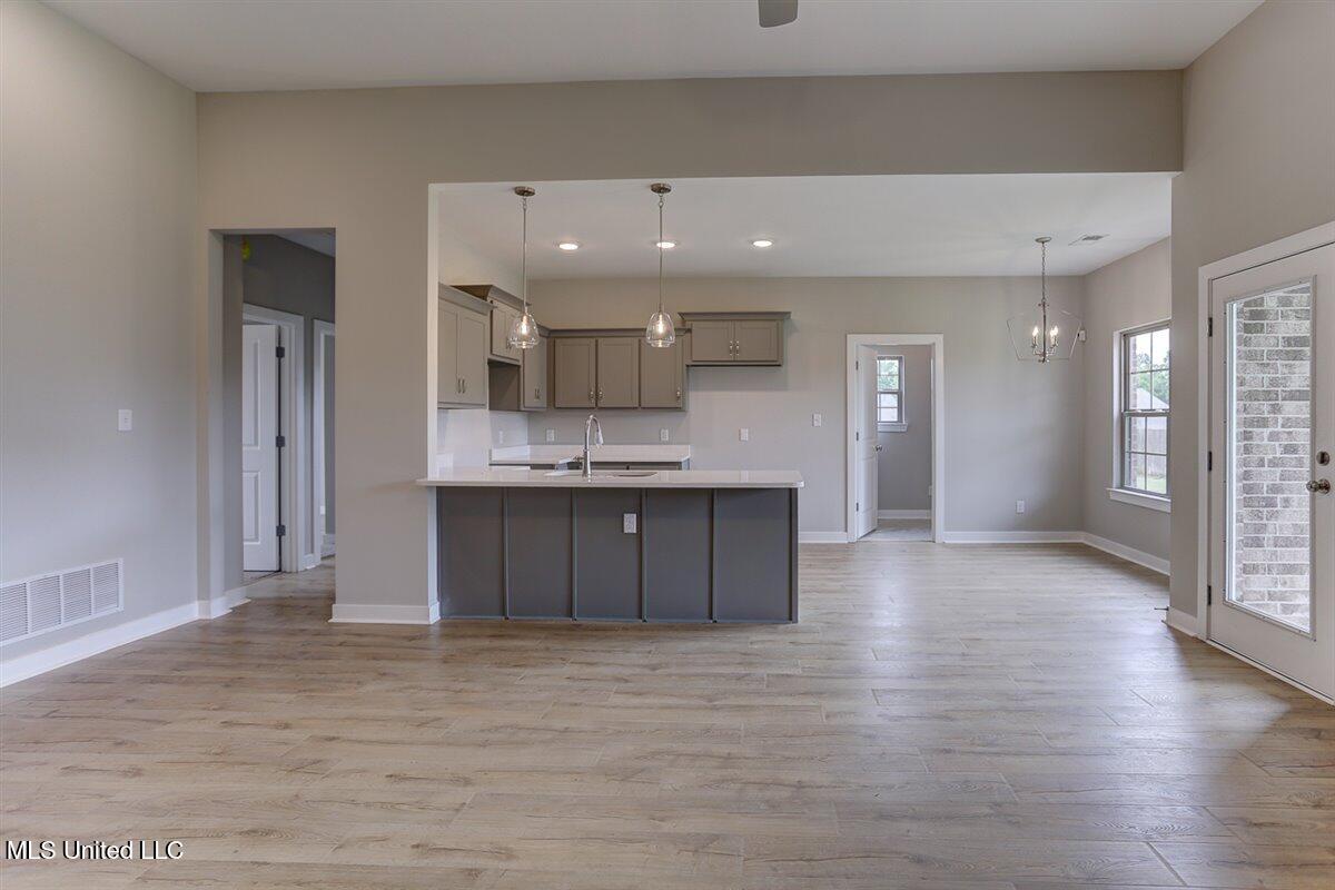 7735 Carmel Cove Walls, MS 38680 - Photo 5 of 20 Family Room to Kitchen