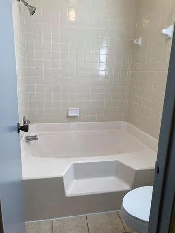 a bathroom with a vanity and a mirror